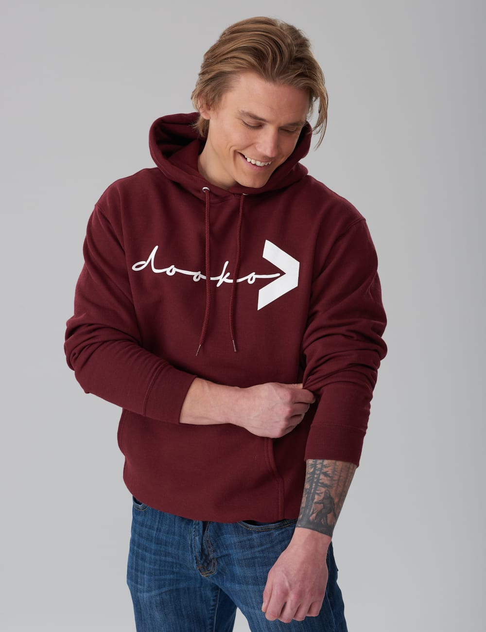 model in a maroon dooko hoodie H-one
