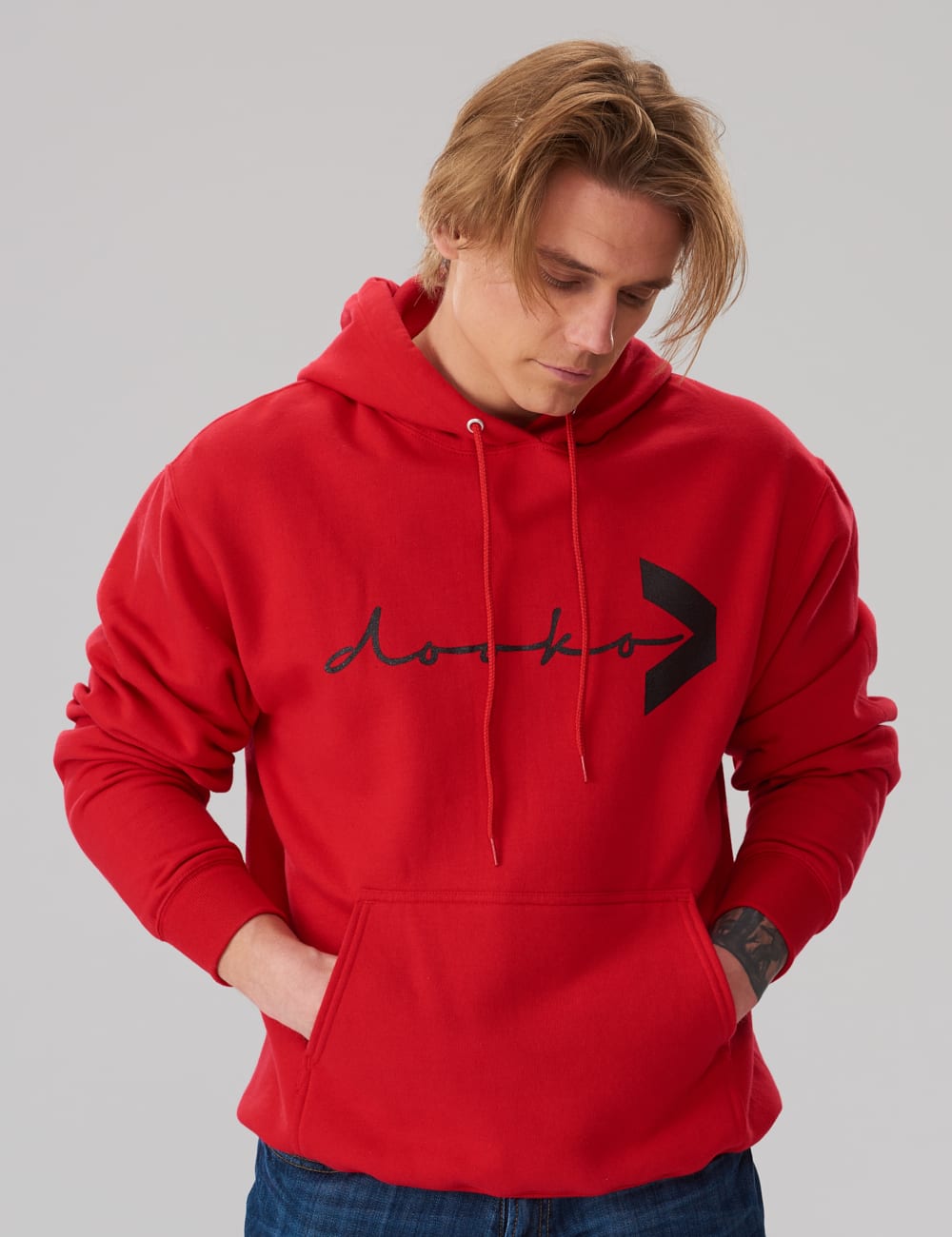 model in a red color dooko hoodie H-one