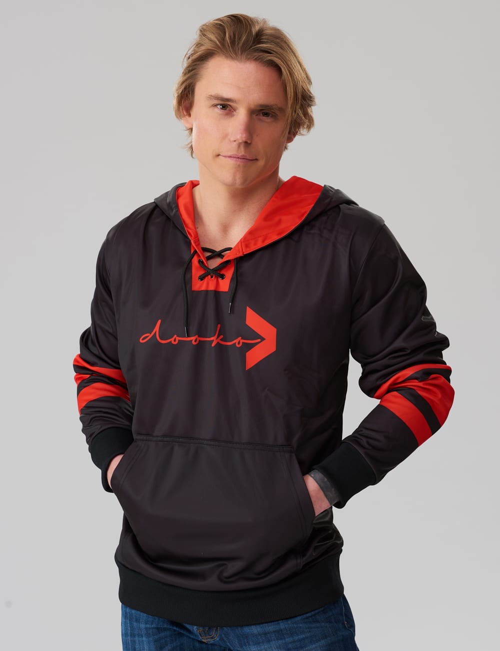 model wearing a black lace-up hoodie with red stripes