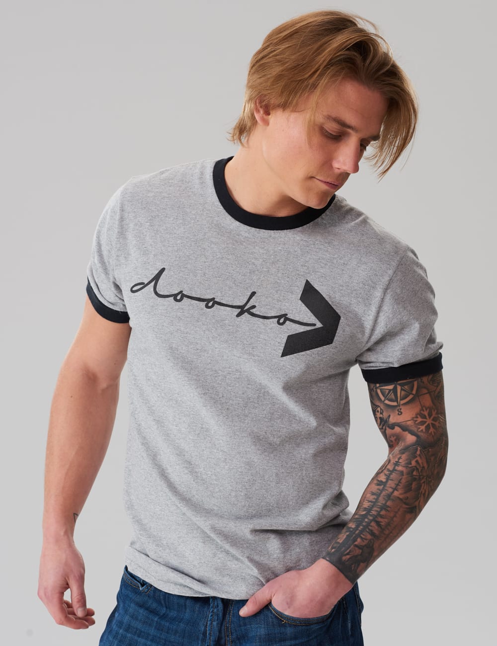 model wearing the gray ringer t-shirt by dooko